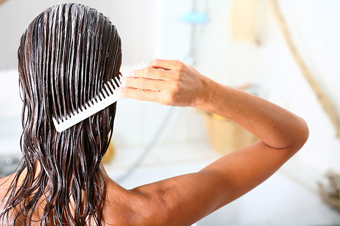 application masque cheveux bouclés